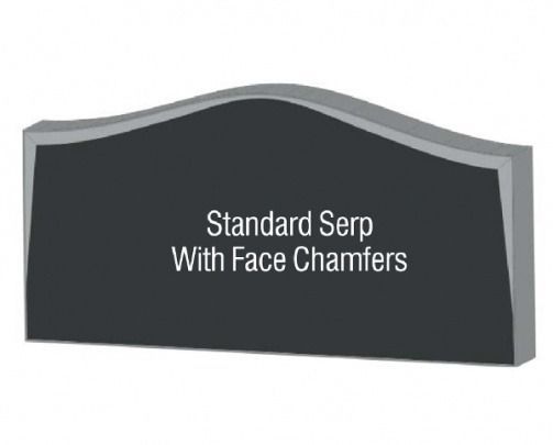 Dark grey tombstone with curved top and text 