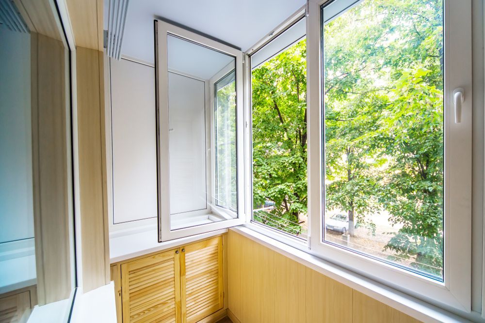 Two Workman Installing A Window