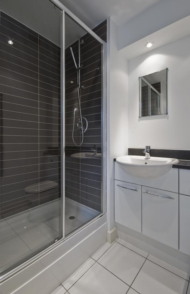 Bathroom With Shower Screen And Sink — Glass Installations & Repairs In Byron Bay, NSW