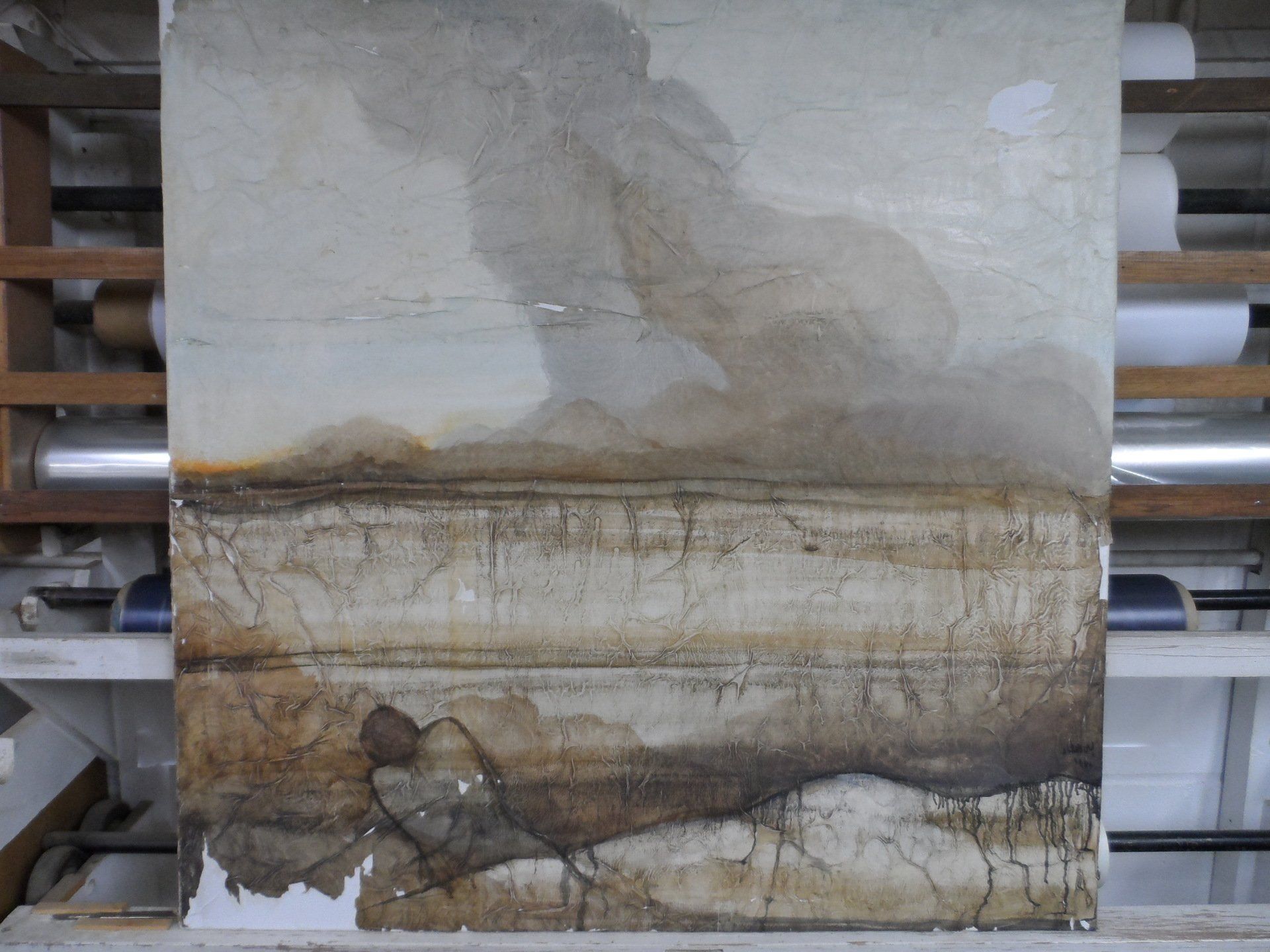 Restoration of unusual media: wrinkled tissue paper with varnish glazes