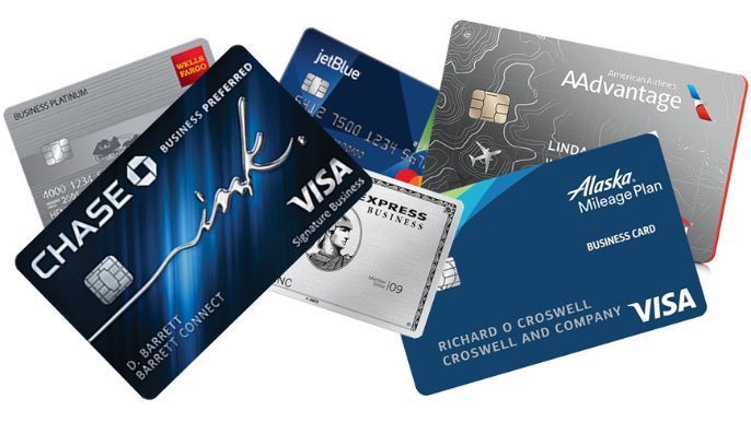 A bunch of credit cards are stacked on top of each other