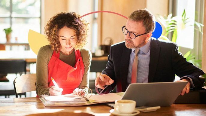 A pen is sitting next to a card that says line of credit.