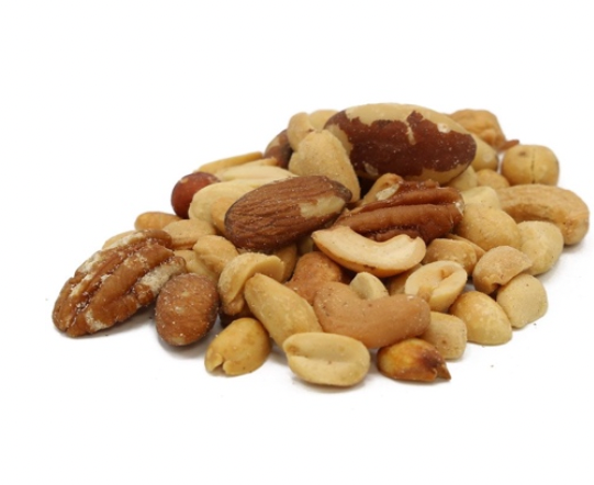 a pile of nuts including peanuts almonds and pecans