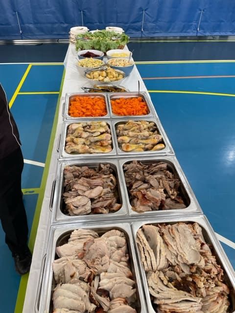 A Long Buffet Table Filled With Lots Of Different Types Of Food — Tru Blu Catering In Woolgoolga, NSW