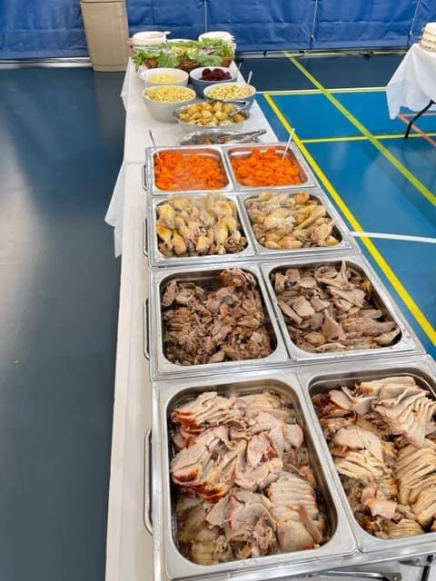 A Buffet Table With A Variety Of Food On It — Tru Blu Catering In Woolgoolga, NSW
