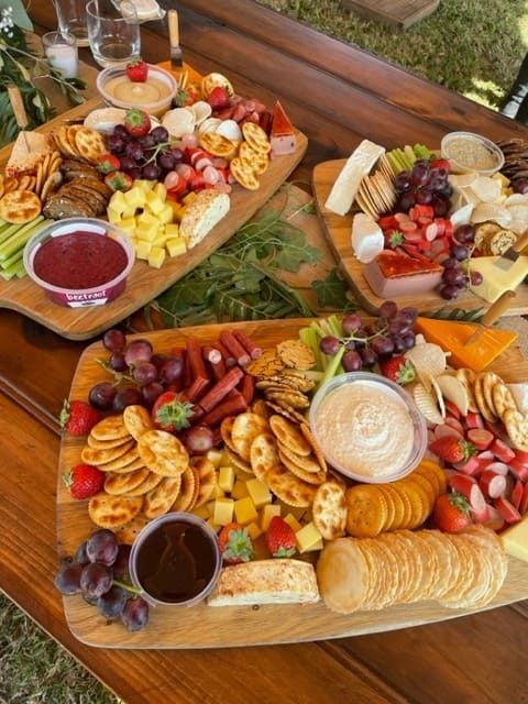 A Wooden Cutting Board Filled With Lots Of Different Types Of Food — Tru Blu Catering In Nambucca, NSW