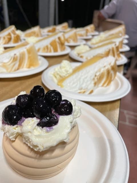 A Cake With Blueberries And Whipped Cream On A Plate — Tru Blu Catering In Taree, NSW