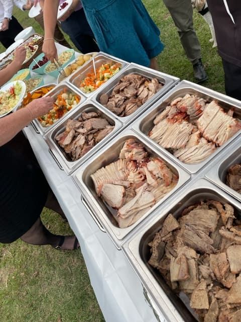 A Buffet Table With Many Trays Of Food On It — Tru Blu Catering In Wauchope, NSW