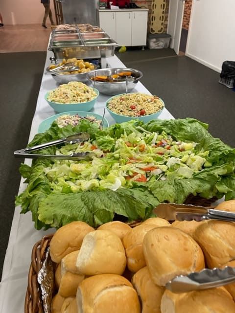 A Buffet Table With A Bunch Of Food On It — Tru Blu Catering In Port Macquarie, NSW