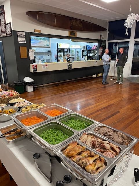 A Buffet Table With Lots Of Food On It In A Room — Tru Blu Catering In Port Macquarie, NSW