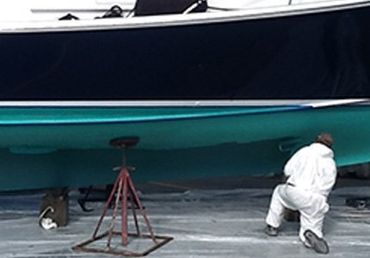 Yacht Services — Man Fixing Boat in Edmonds, WA
