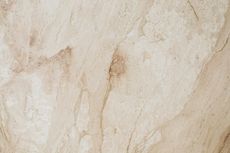 Beige marble with brown veining.