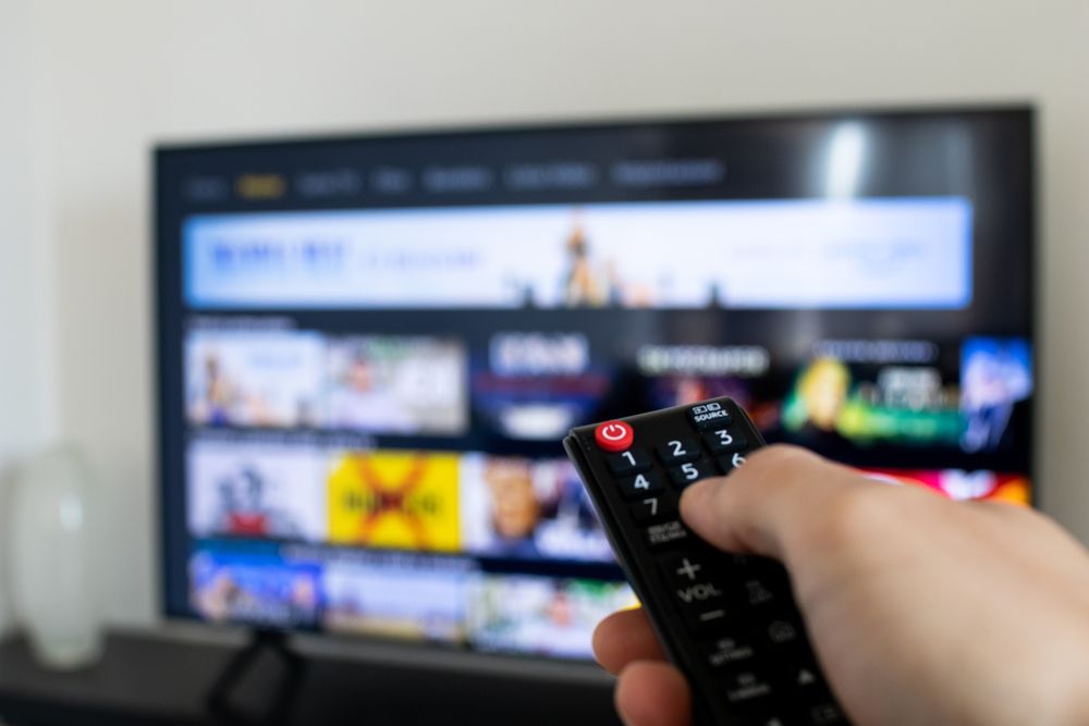 TV Remote Pointed at a Blurred Streaming Menu on a Television Screen — MATV Systems Australia Pty Ltd in Wickham, NSW