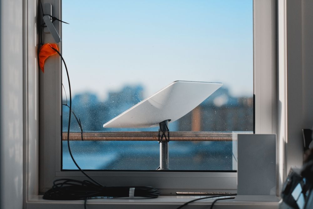 Small White Device on a Windowsill With Cables — MATV Systems Australia Pty Ltd in Wickham, NSW
