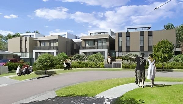 A Man and Woman Are Walking Down a Sidewalk in Front of A Building — MATV Systems Australia in Mayfield, NSW