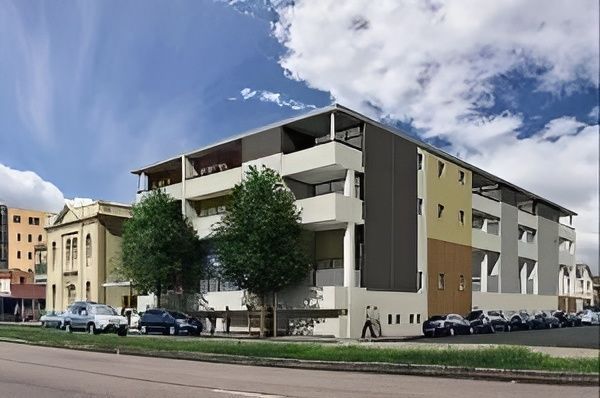 An Artist's Impression of A Building with Cars Parked in Front of It — MATV Systems Australia in Mayfield, NSW