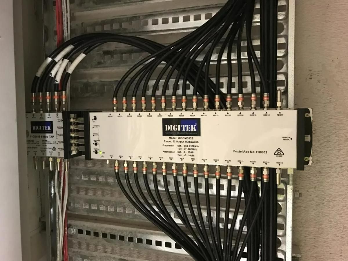 A Bunch of Wires Are Connected to A Box that Says 1064 TEK — MATV Systems Australia Pty Ltd in Hunter Valley, NSW