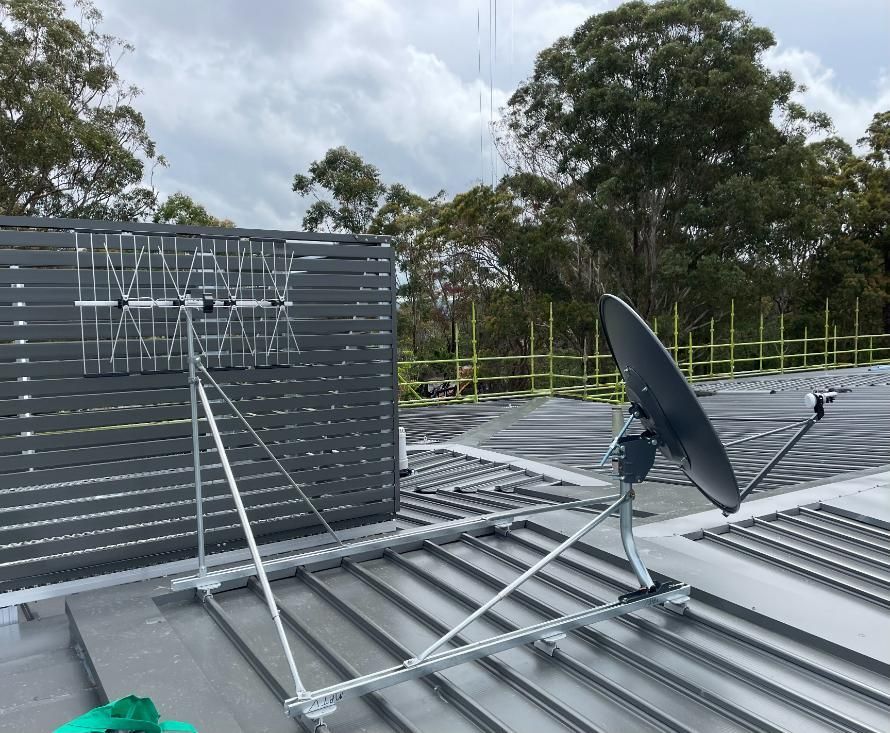 A Satellite Dish Is Sitting on Top of A Roof — MATV Systems Australia in Mayfield, NSW