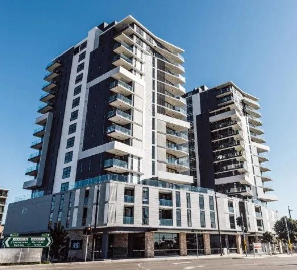 A Tall Building with A Lot of Windows and Balconies — MATV Systems Australia Pty Ltd in Wickham, NSW