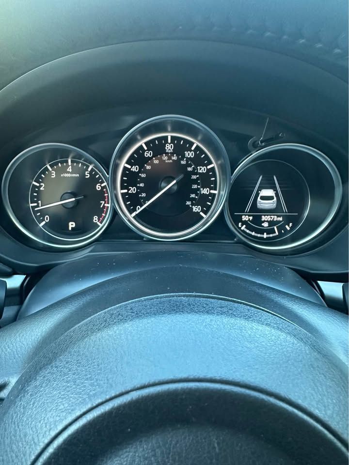 A close up of the dashboard of a car