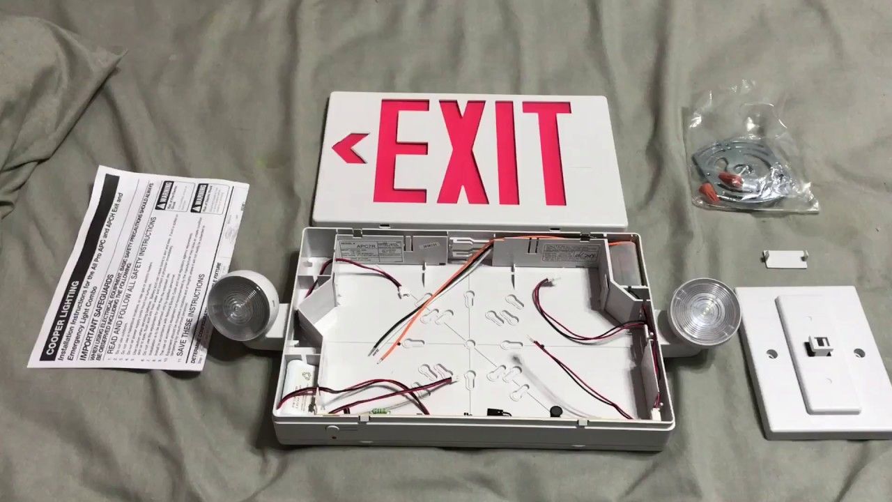 Disassembled exit sign with red 