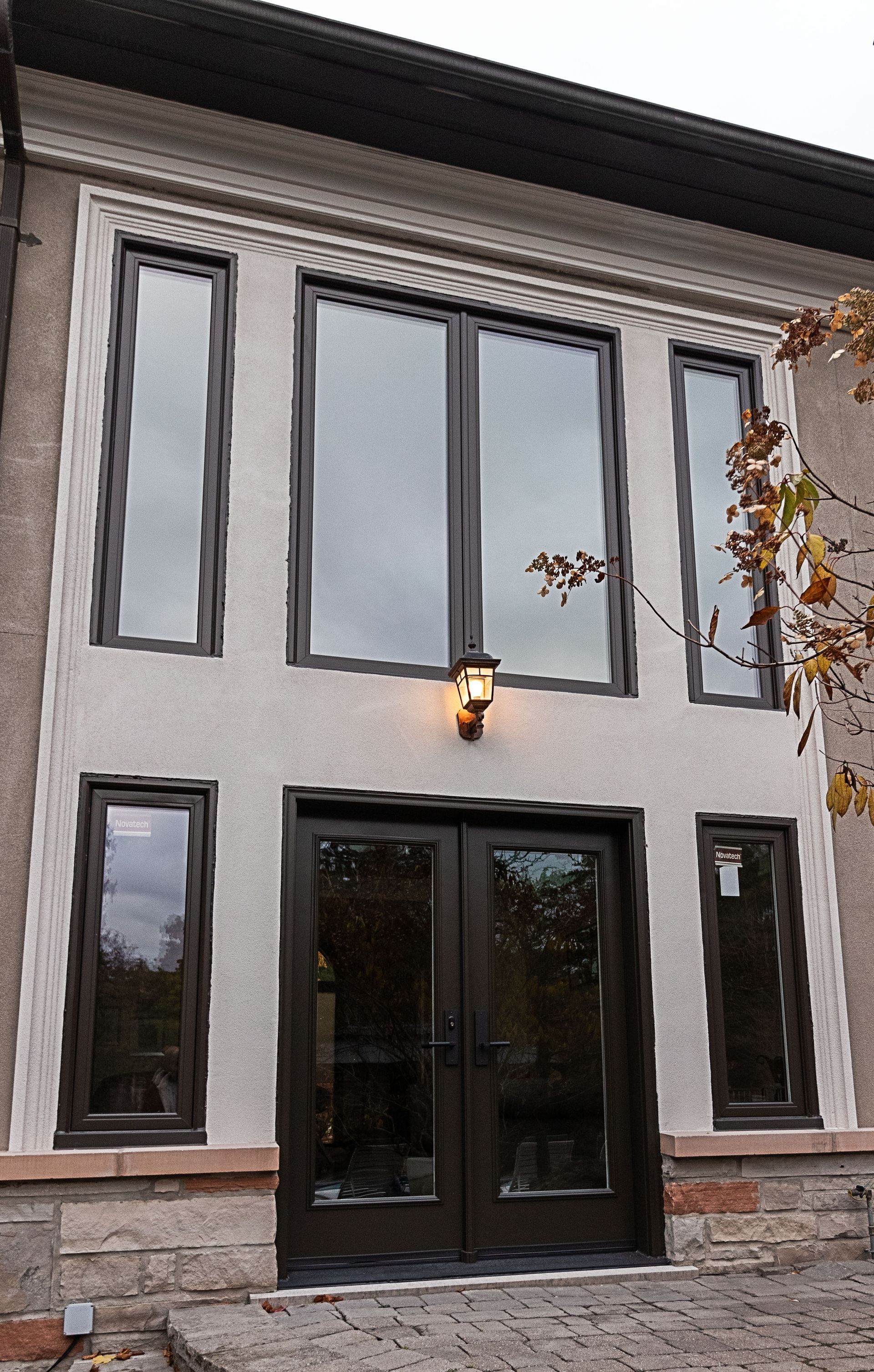 A large building with a lot of windows and doors