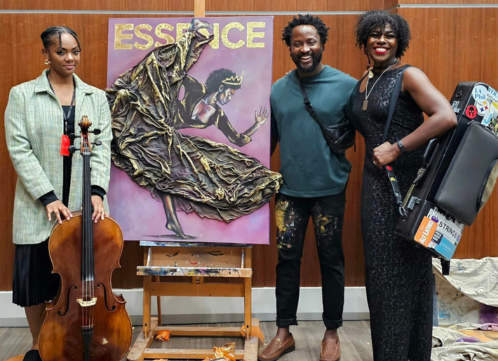 Ola the artist with the ballet and a painting of a dancer