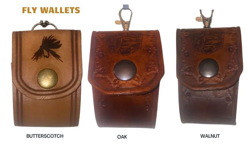 Three brown leather fly wallets are shown on a white background