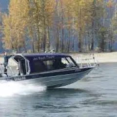 A boat is floating on top of a body of water.