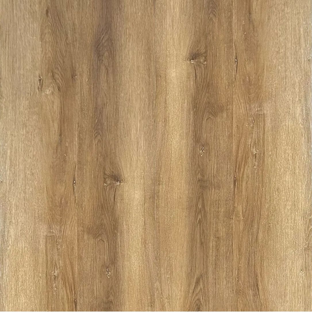 Textura de veta de madera en tonos marrones y tostados, similar a un piso de madera.