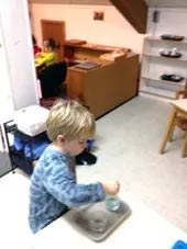 Child Playing in Classroom — Woodridge, IL — Montessori of Woodridge