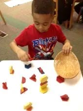 Child Playing with Puzzles — Woodridge, IL — Montessori of Woodridge