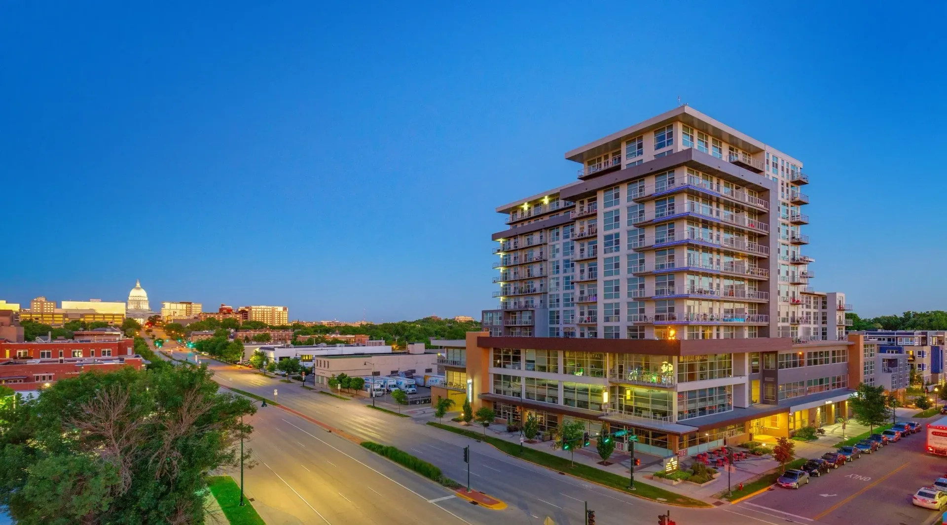 A large white building with a dome on top of it
