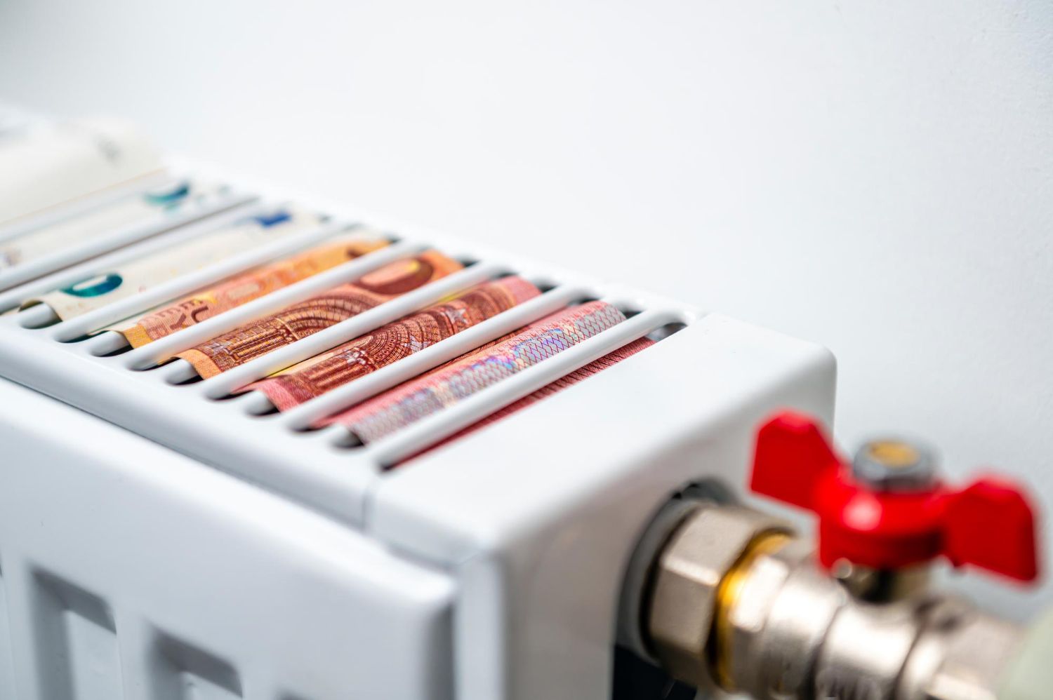 A close-up of a radiator with money on it.