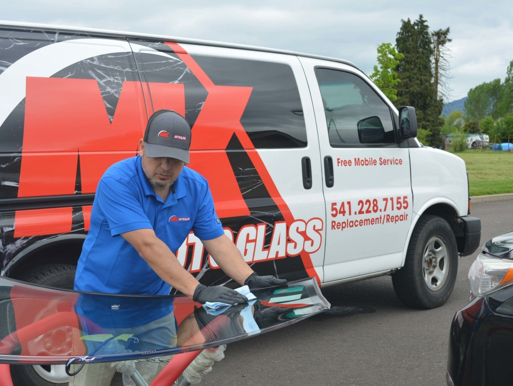 MK Auto Glass repairing rear window 