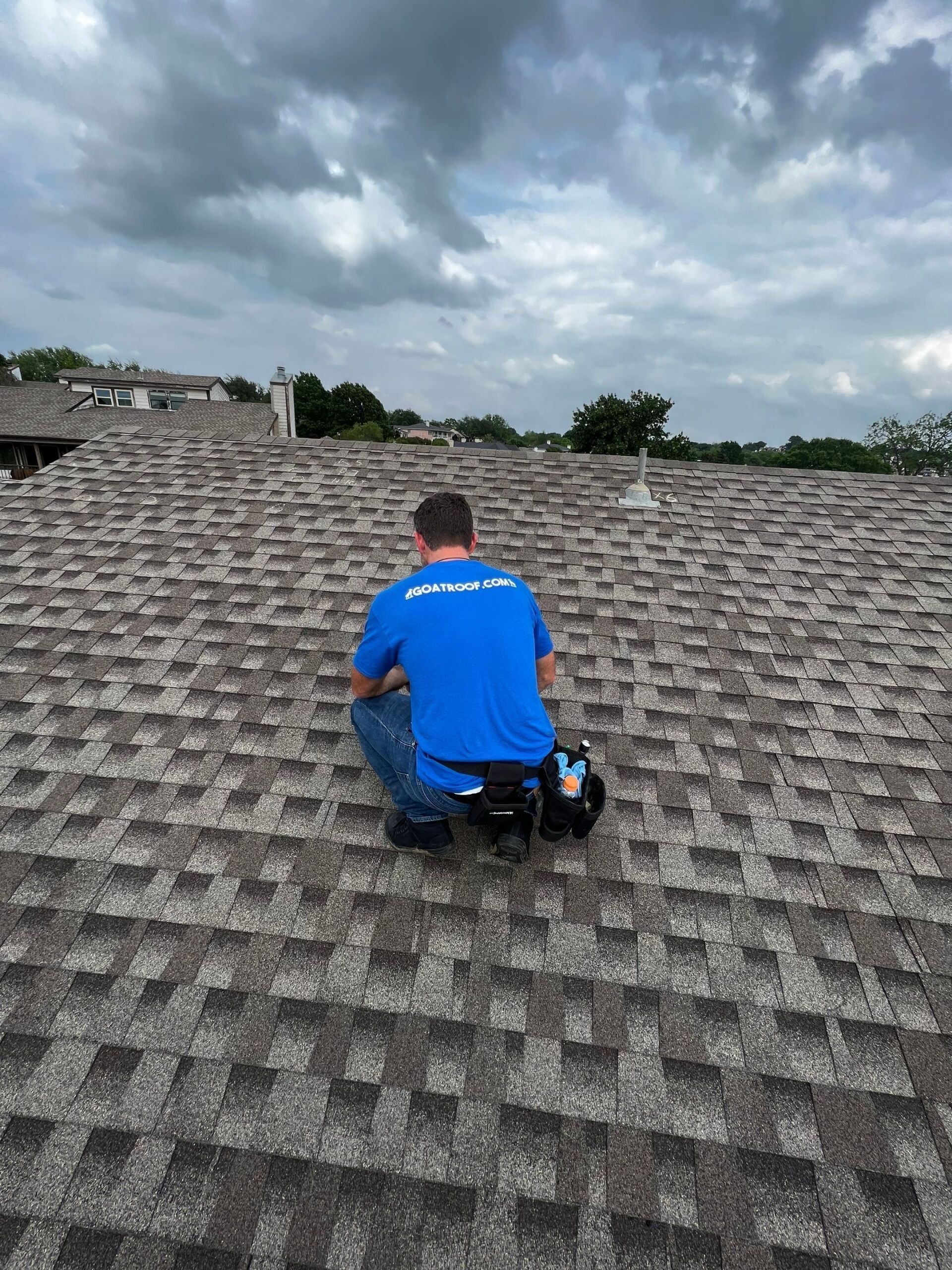 Goat professional installing new roofing