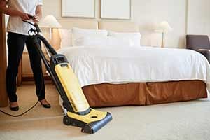 Man Moping the floor — house cleaning in Greeley, CO
