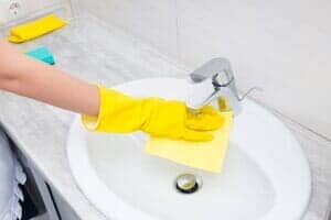 Cleaning a basin — janitorial in Greeley, CO