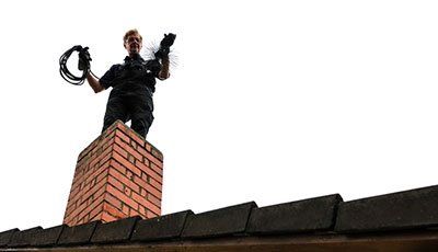 Chimney Sweeps — Man in the Top of Chimney  in Wilmington, OH
