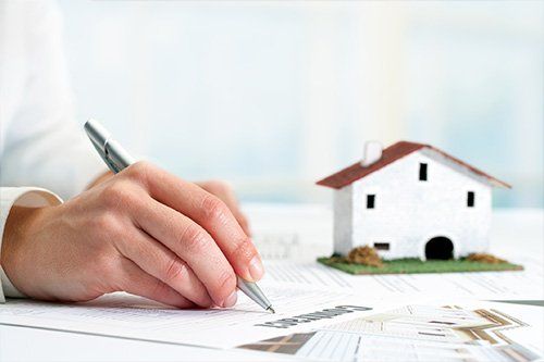 Real Estate Law — Signing Real Estate Document in Stuart, FL
