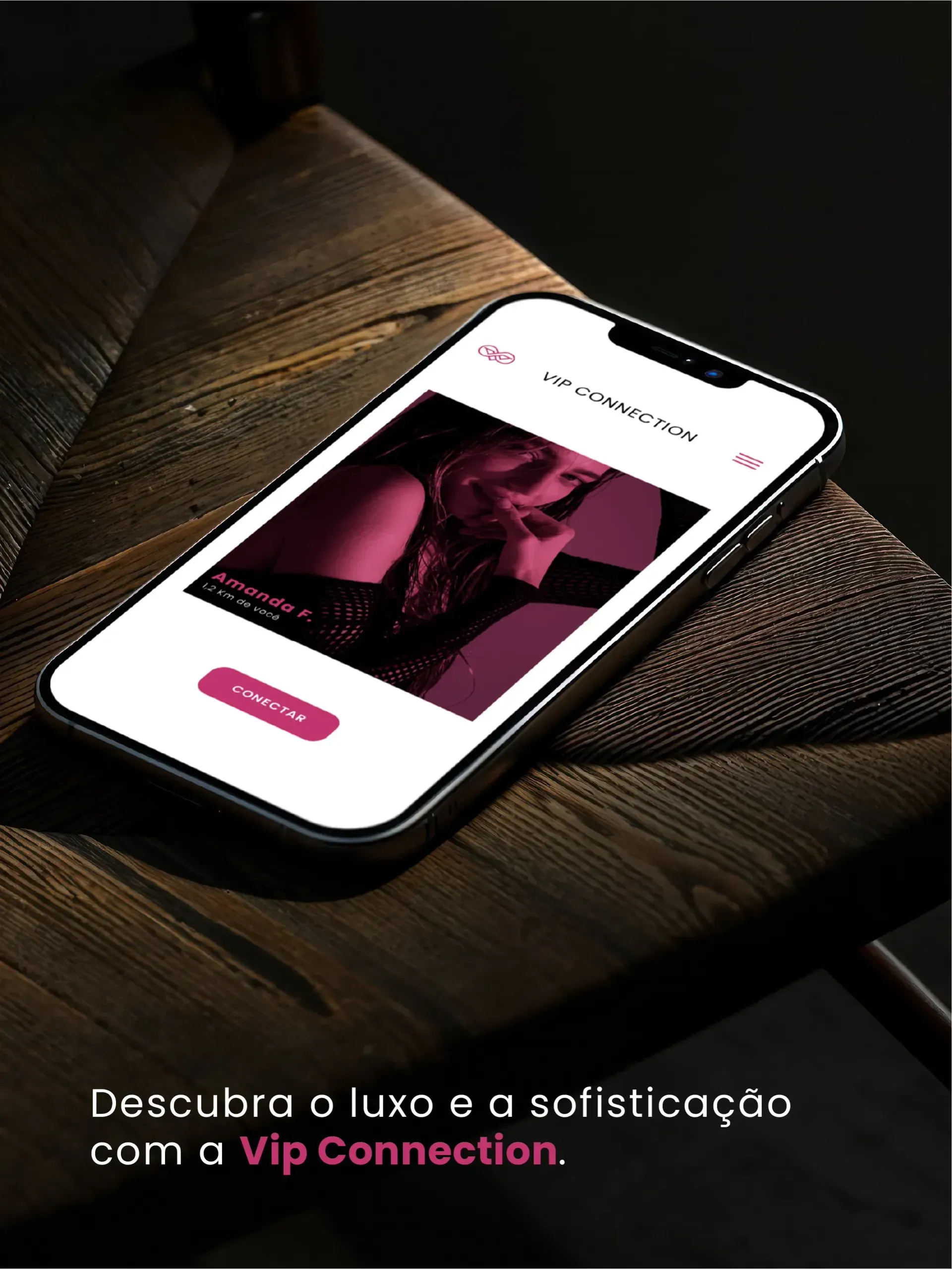 A smartphone displaying an app with a woman's image, resting on a wooden surface. Text says 