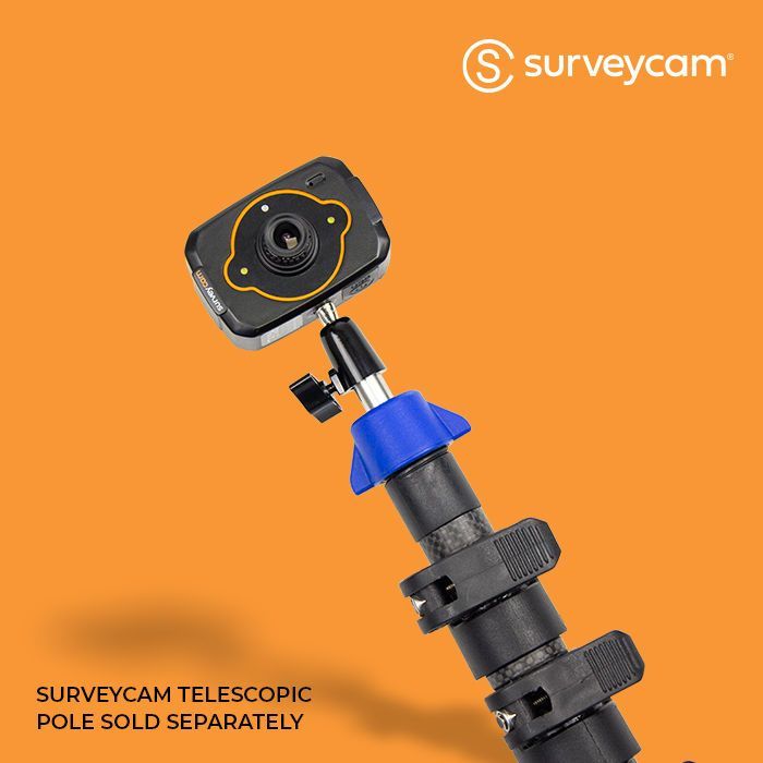 Surveycam camera mounted on a black telescopic pole, orange background.