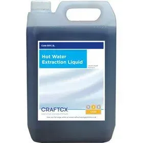 A container of Craftcx Hot Water Extraction Liquid. It is a blue liquid in a white jug with a handle.