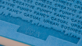 Un primo piano di un pezzo di carta con sopra la parola "urbano".
