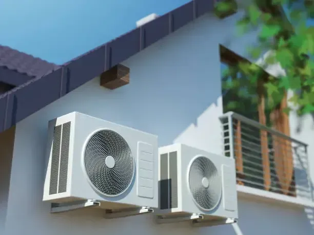 Two White Outdoor Air Conditioning Unit — Alpine Refrigeration & Air Conditioning Pty Ltd in Wollongong, NSW