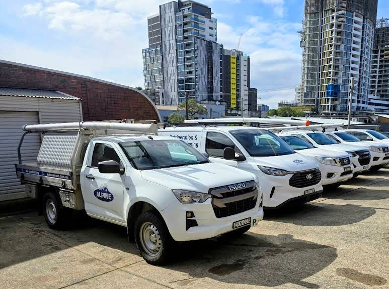 White Wall With Mounted Air Conditioner — Alpine Refrigeration & Air Conditioning Pty Ltd in Wollongong, NSW