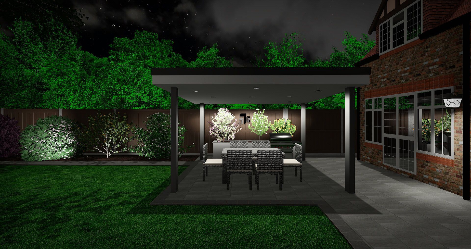 a patio with a table and chairs under a canopy at night