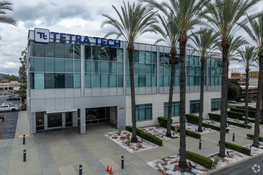 Unified School District and the Ernie B. Sotomayor Education Center, with greenery and a blue sky.