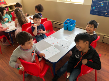 Boys Sitting Around Class Table, Daycare Center in Marin CA
