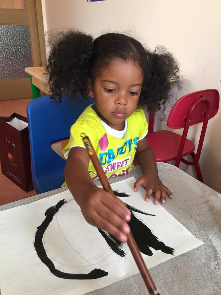 Young Student Painting, Preschool Center in Novato CA